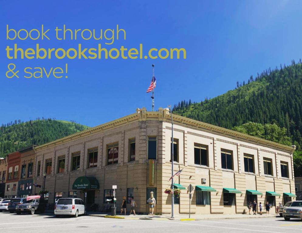 a building with an american flag on top of it at The Brooks Hotel Restaurant and Lounge in Wallace