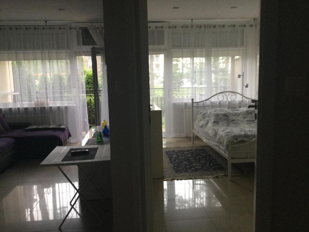 Postel nebo postele na pokoji v ubytování Apartament Żagiel