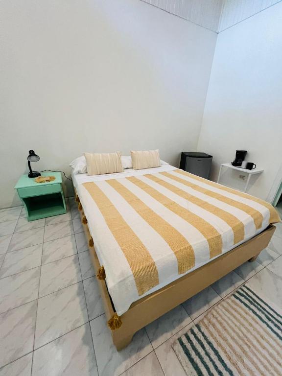 Postel nebo postele na pokoji v ubytování Hotel Exotic Lodge