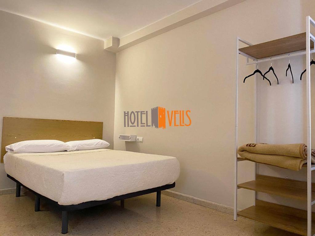 Postel nebo postele na pokoji v ubytování Hotel Velis