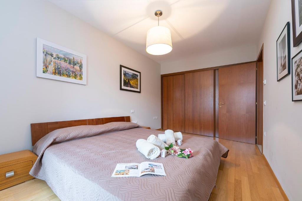 Posteľ alebo postele v izbe v ubytovaní Casa Margherita Few Minutes From Lake - Happy Rentals