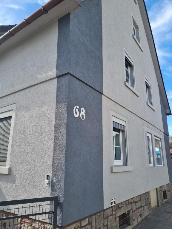 a building with the painted on the side of it at Husic Immobilien und Handwerkerservice in Rimbach