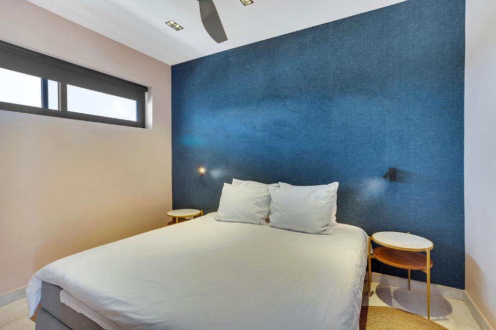 Postel nebo postele na pokoji v ubytování SENSES Boutique Hotel & Apartments