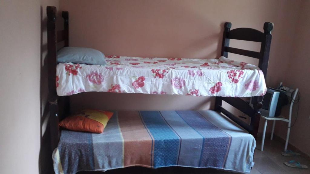Un ou plusieurs lits superposés dans un hébergement de l'établissement Chácara Vale dos Eucaliptos