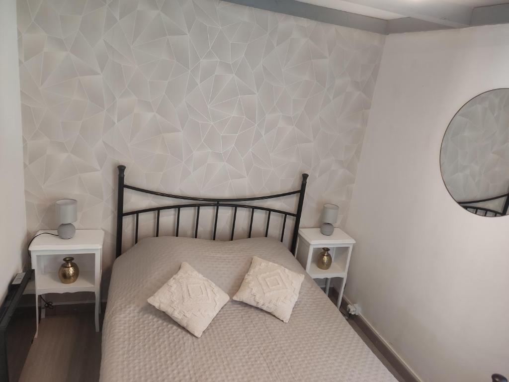 Postel nebo postele na pokoji v ubytování Maisonnette