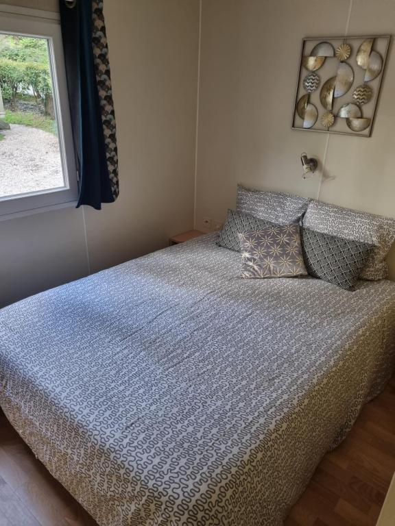 Postel nebo postele na pokoji v ubytování Camping L'Orée des Cévennes