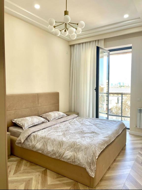 Postel nebo postele na pokoji v ubytování - Cozy Apartment in Cozy Location -