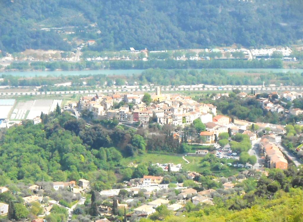 an aerial view of a small town in a valley at La Casetta in Gattières