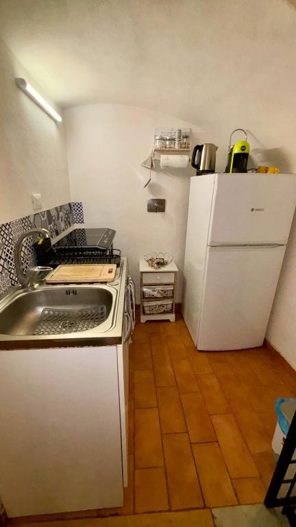 Kuchyň nebo kuchyňský kout v ubytování Casa Gialla