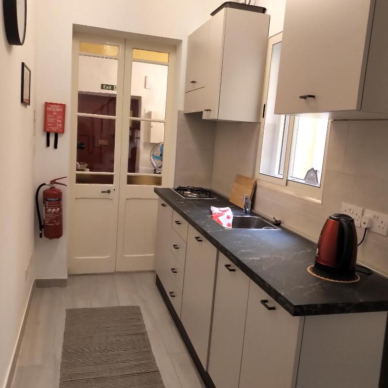 Kuchyň nebo kuchyňský kout v ubytování Townhouse 7