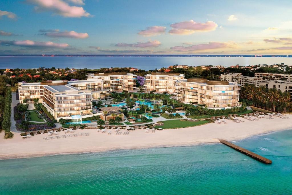 an aerial view of a resort on the beach at The St Regis Longboat Key Resort in Longboat Key