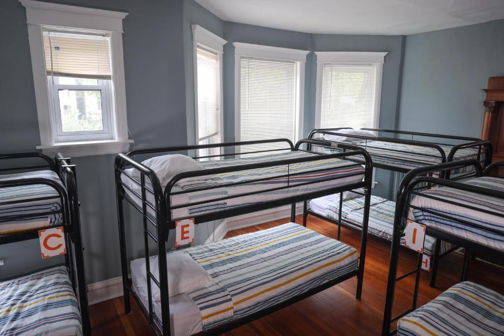 Postel nebo postele na pokoji v ubytování Wrigley Hostel - Chicago