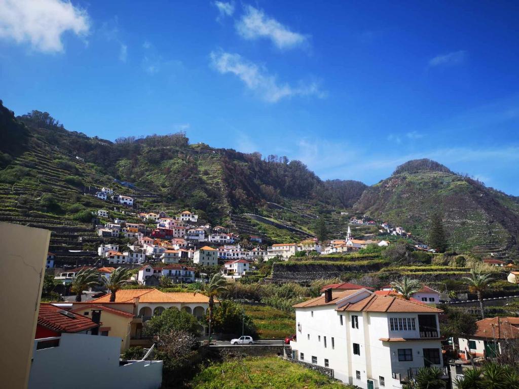 a view of a town on a mountain at Hotel Euro Moniz in Porto Moniz