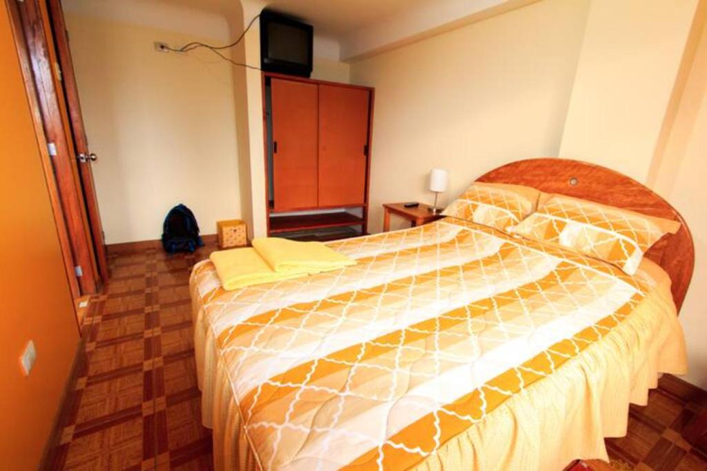 Postel nebo postele na pokoji v ubytování La Casa de Momo