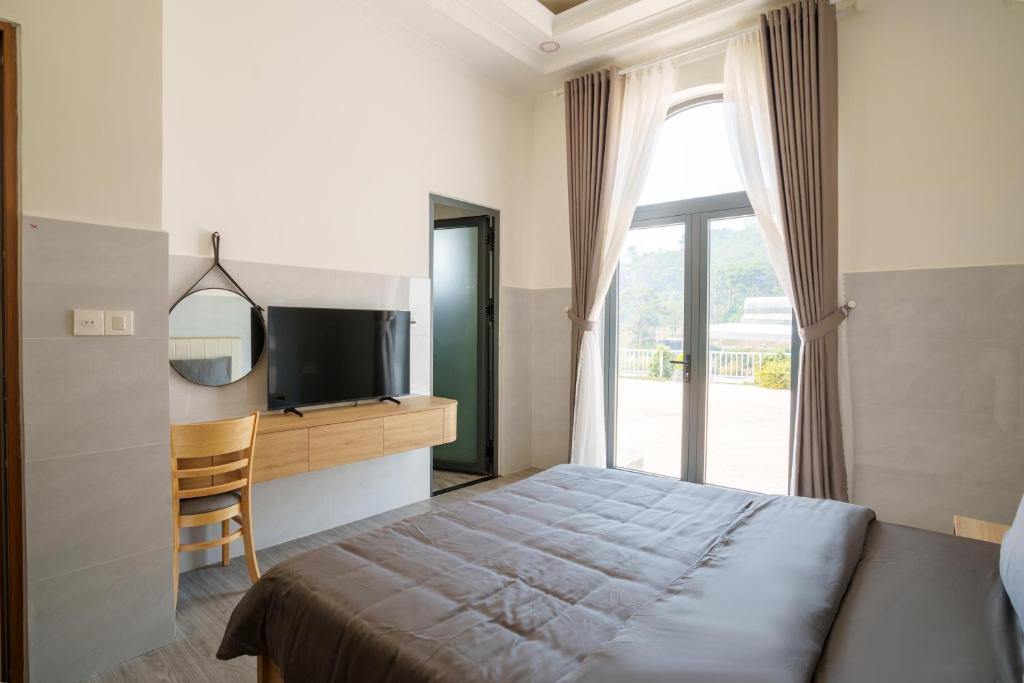 Postel nebo postele na pokoji v ubytování Serene Stay