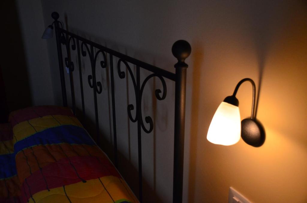 Posteľ alebo postele v izbe v ubytovaní B&B Il Casolare