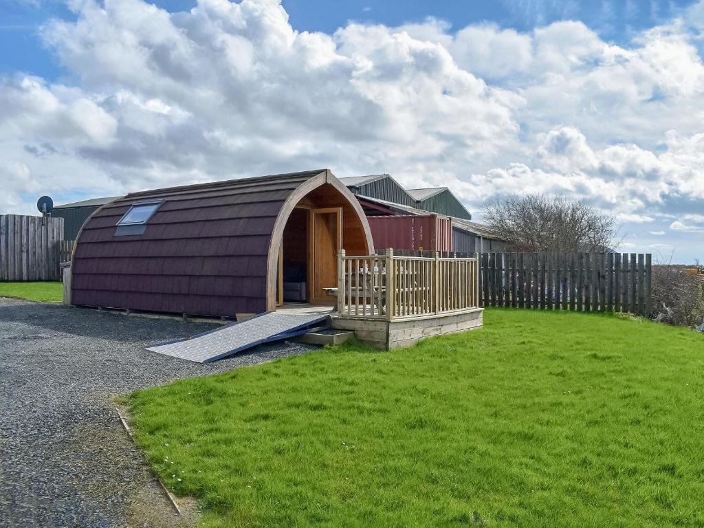 a barn with a ramp in a yard at Selker View-uk1397 in Corney