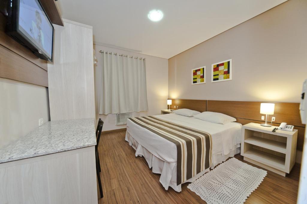 Postel nebo postele na pokoji v ubytování Hotel Sol By MRHotelaria