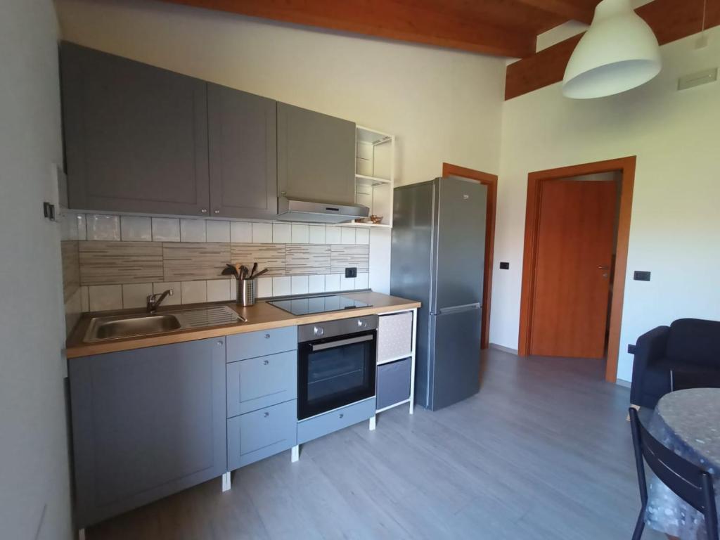Kuchyň nebo kuchyňský kout v ubytování B&B Tra Gli Ulivi