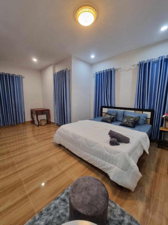 Postel nebo postele na pokoji v ubytování The Hub Kampot