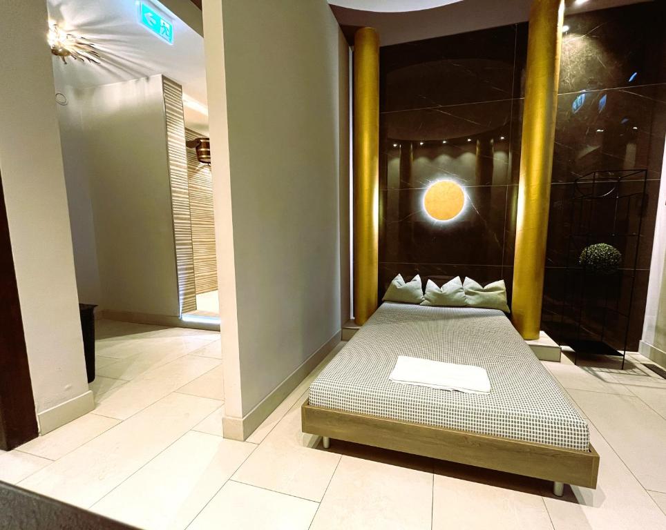 Postel nebo postele na pokoji v ubytování AMBER HOTEL Bavaria