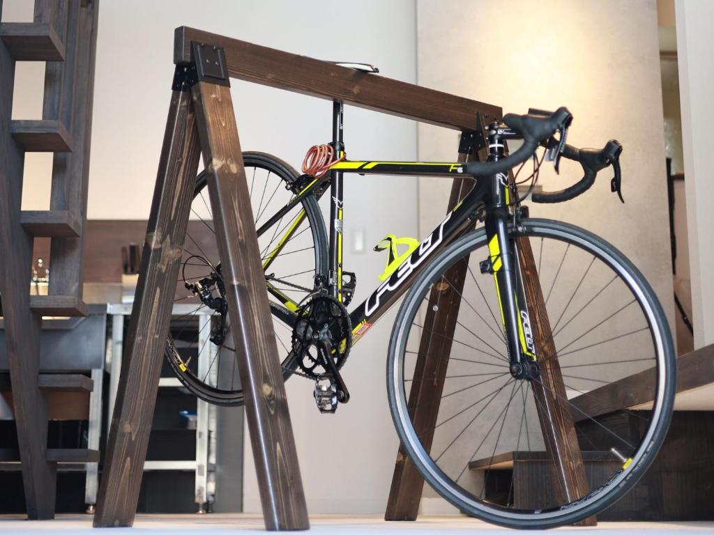 a bike is hanging from a bike rack at KiCHi - Vacation STAY 15503 in Awaji