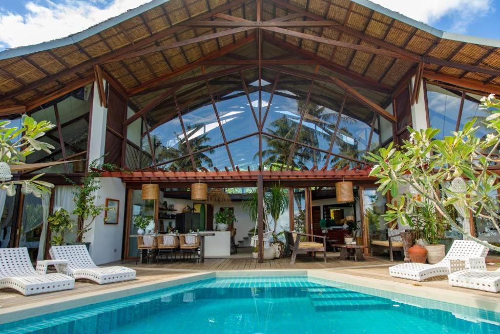 Bazén v ubytování Mantaray Siargao nebo v jeho okolí