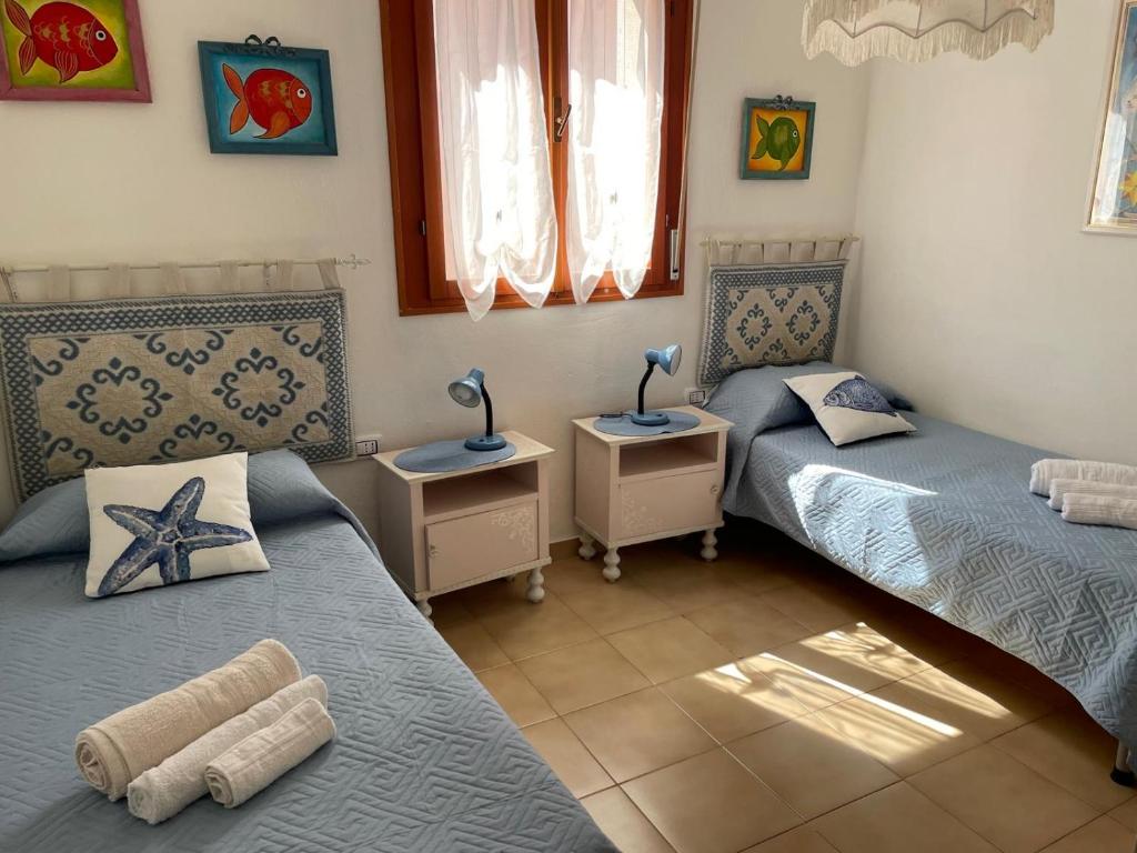 Postel nebo postele na pokoji v ubytování Casa Marina