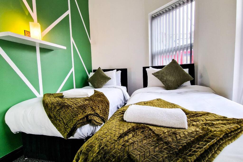 Postel nebo postele na pokoji v ubytování Beautiful flat on Breck Road