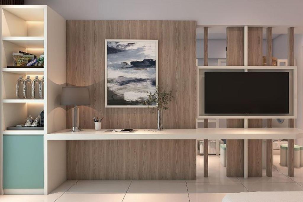 TV a/nebo společenská místnost v ubytování Four Points by Sheraton Bali, Kuta