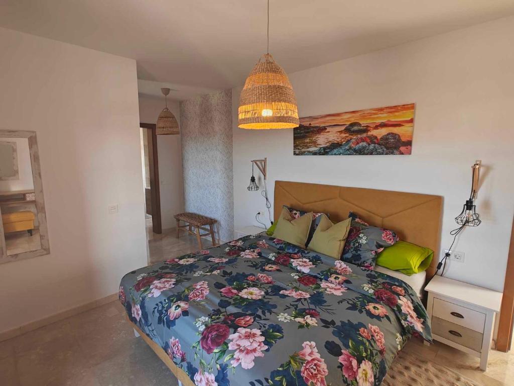 A bed or beds in a room at Casa del Sol Naciente - heated pools - wifi - UK,BE,NL,FR TV channels