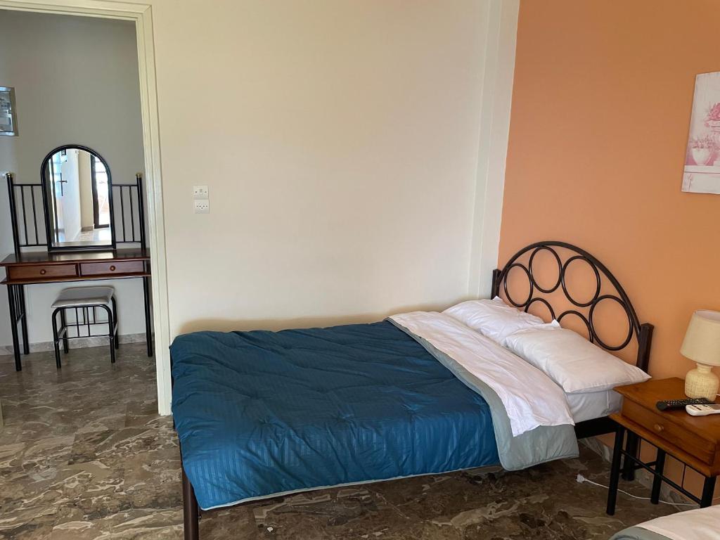 Postel nebo postele na pokoji v ubytování Finikas