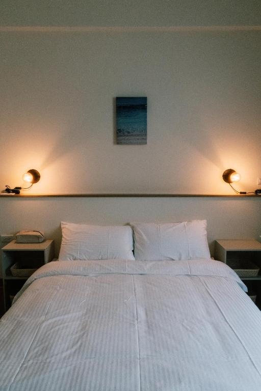 Postel nebo postele na pokoji v ubytování Bow Inn