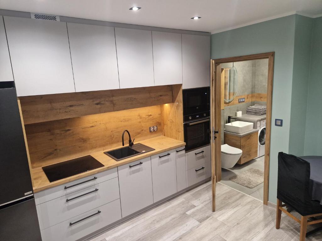 Ένα μπάνιο στο Apartament K&H W Centrum