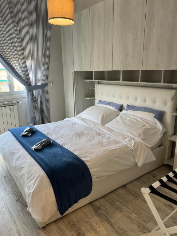 A bed or beds in a room at La Casa di Gio Golf Tennis e parcheggio privato