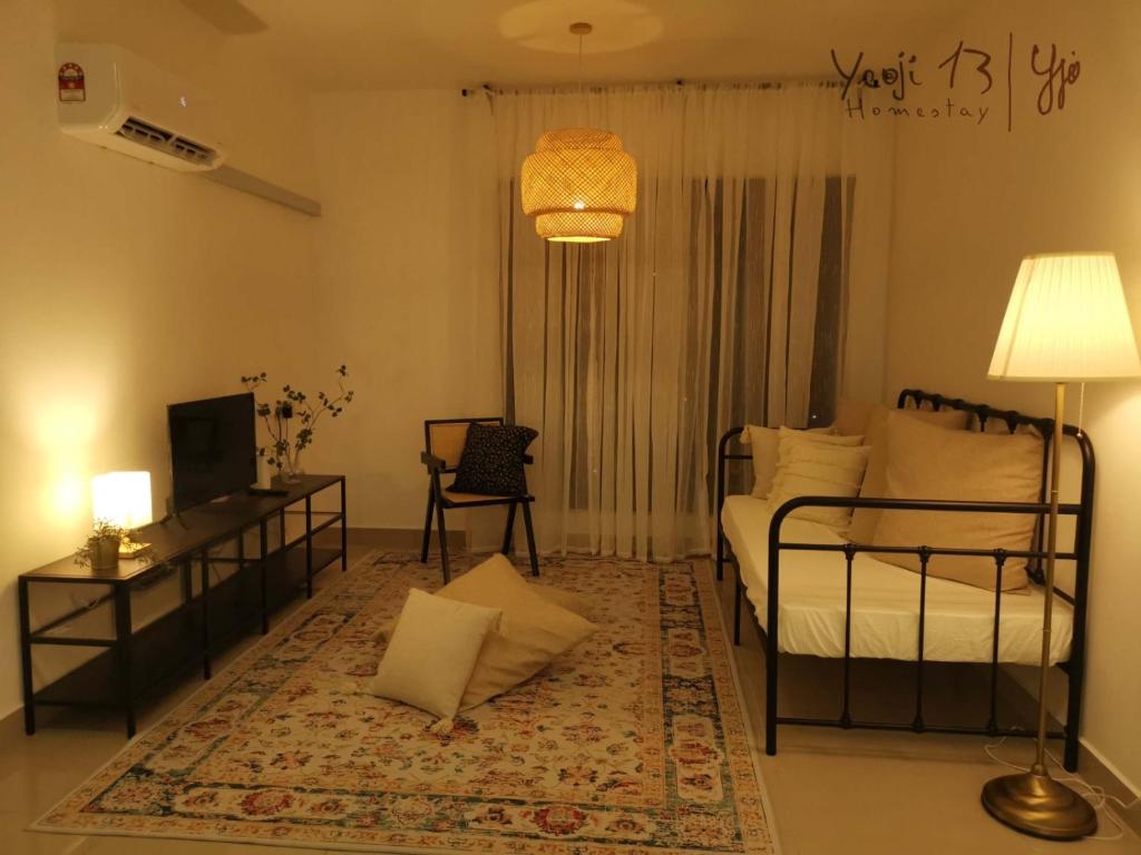 Postel nebo postele na pokoji v ubytování Yeojie 13 Homestay Rawang