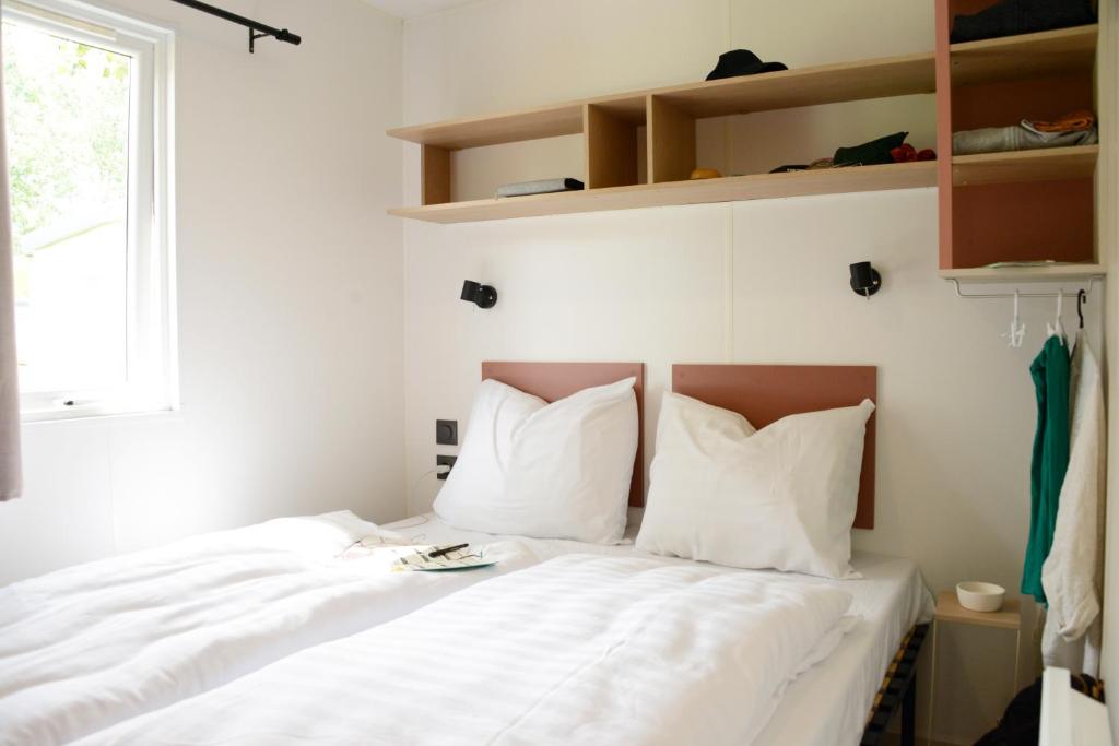 Postel nebo postele na pokoji v ubytování Camping Fuussekaul