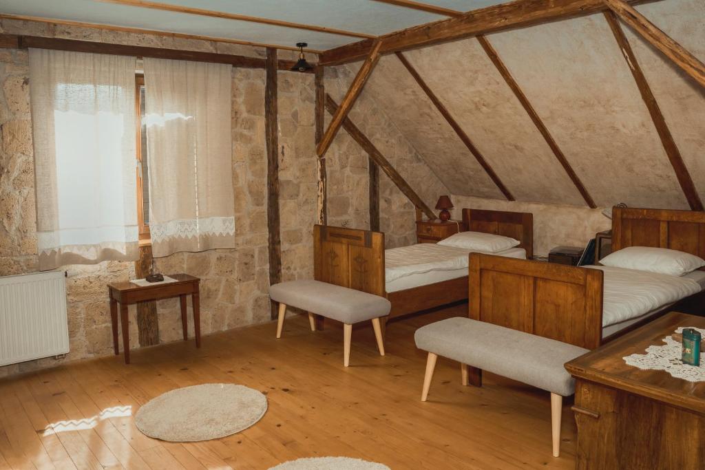 Postel nebo postele na pokoji v ubytování House of Culture and Nature - Hiša Kulture in Nature