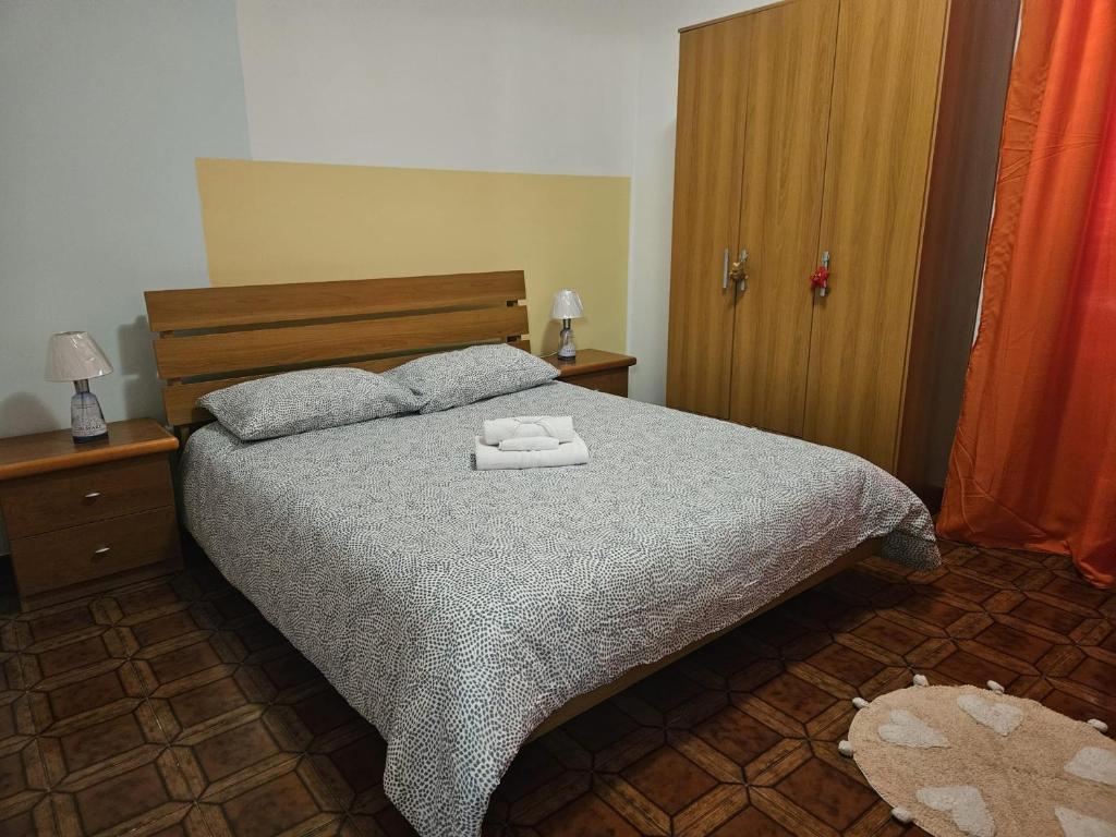 A bed or beds in a room at LA ROSA DEI VENTI