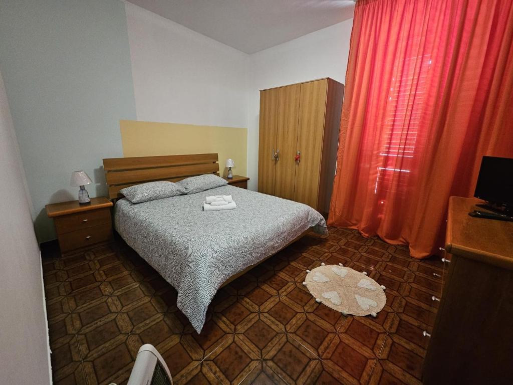 A bed or beds in a room at LA ROSA DEI VENTI