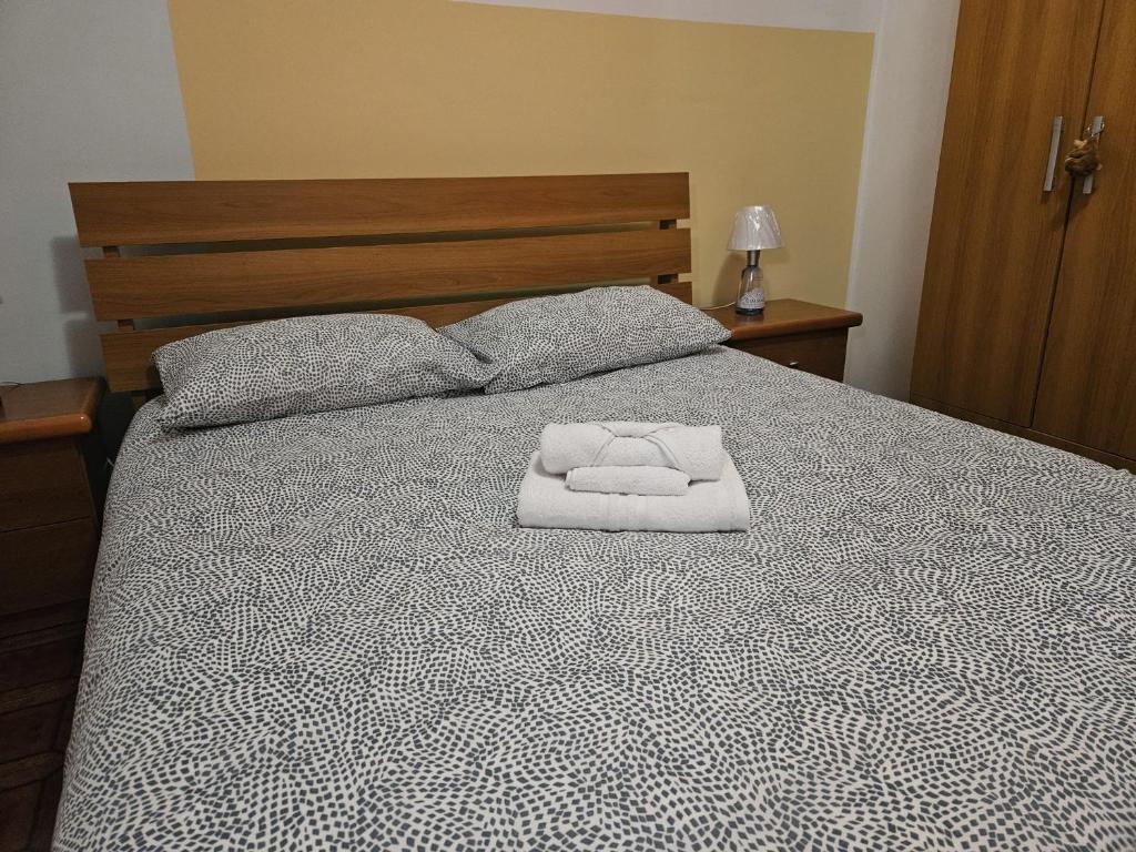 A bed or beds in a room at LA ROSA DEI VENTI