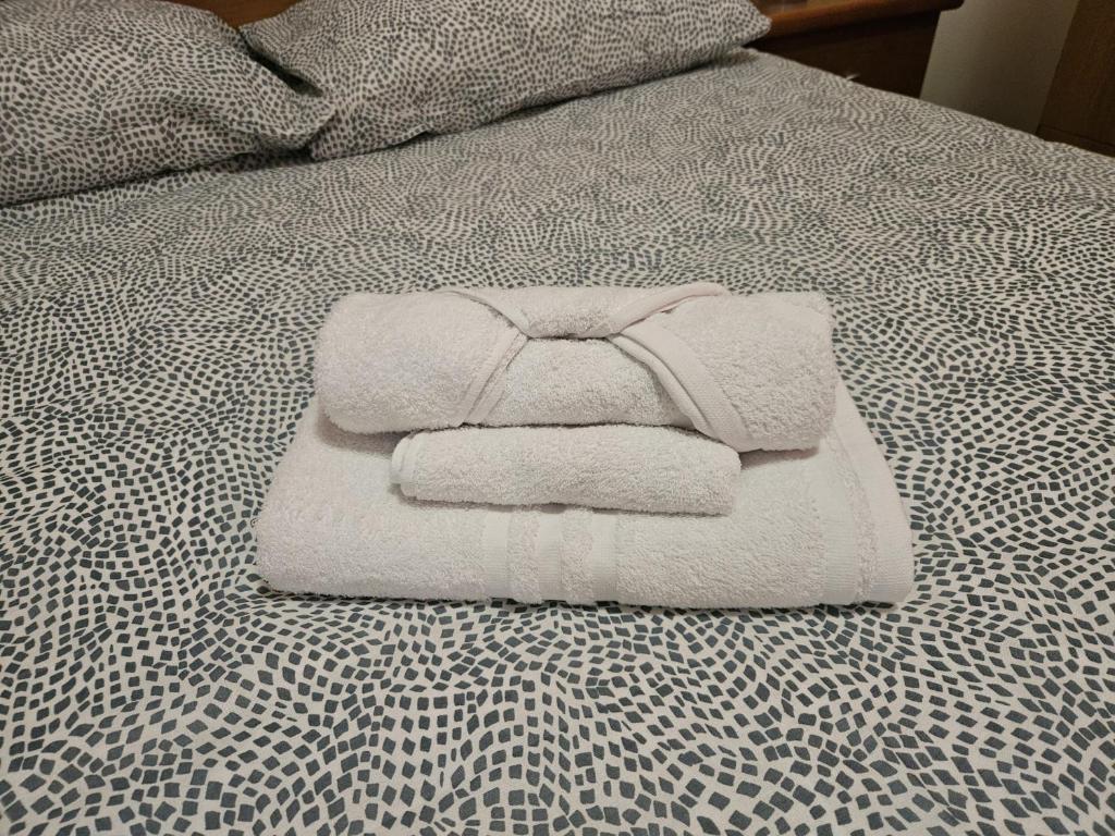 A bed or beds in a room at LA ROSA DEI VENTI