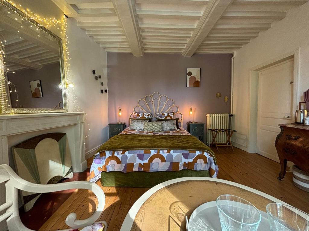 Postel nebo postele na pokoji v ubytování B&B Nathalie