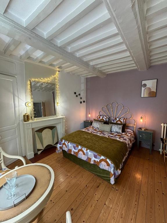 Postel nebo postele na pokoji v ubytování B&B Nathalie