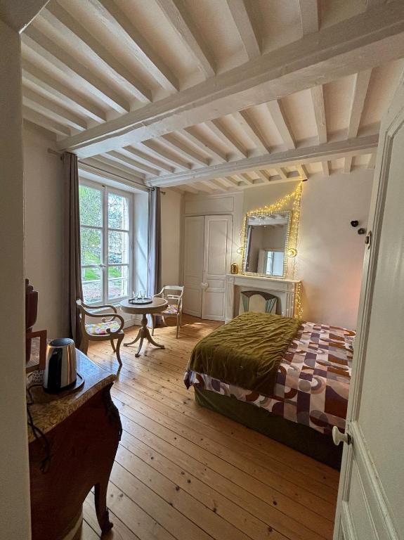 Postel nebo postele na pokoji v ubytování B&B Nathalie