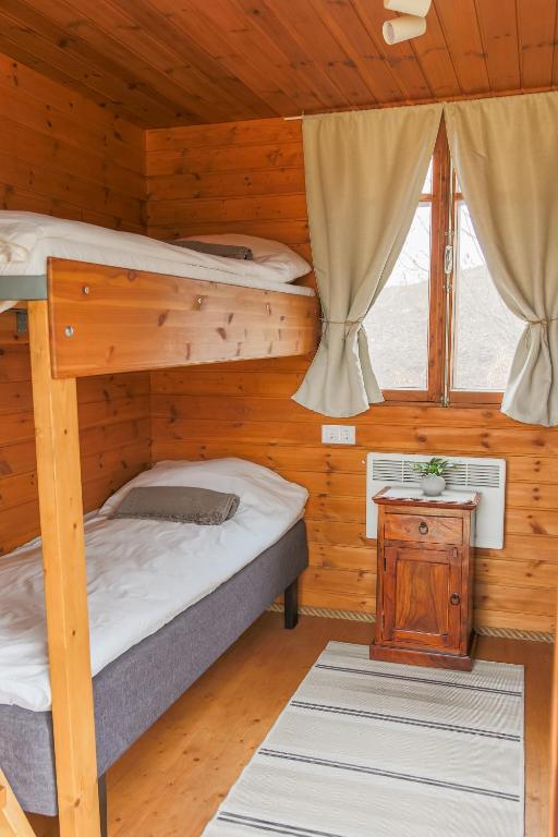 Postel nebo postele na pokoji v ubytování Mätta puhketalu