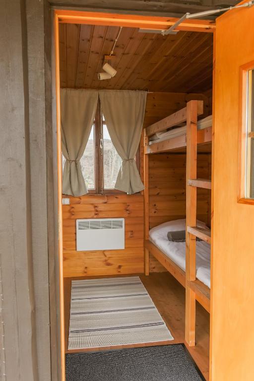 Postel nebo postele na pokoji v ubytování Mätta puhketalu