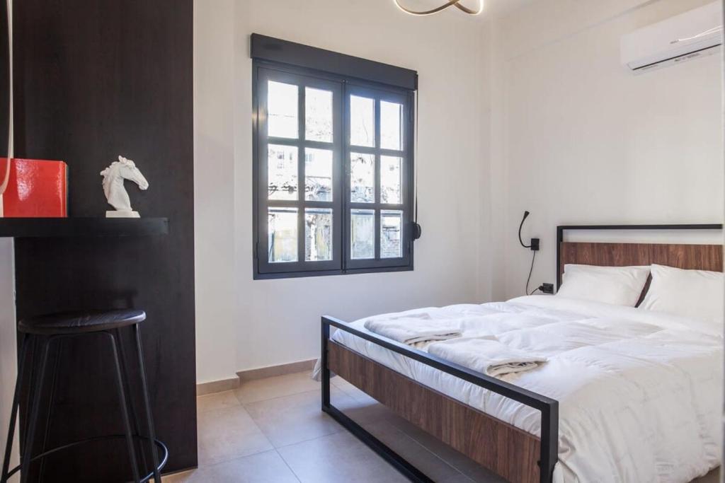 Posteľ alebo postele v izbe v ubytovaní Beautiful Elegant Apartment Next to Monastiraki