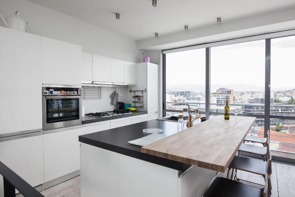 Curated visual reference: Fresh Look at Penthouse With 360 View Of Athens And Private Gym Athens