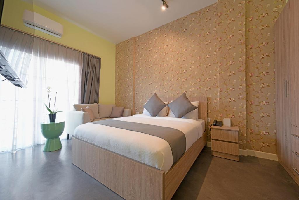 Postel nebo postele na pokoji v ubytování Comfy apart hotel